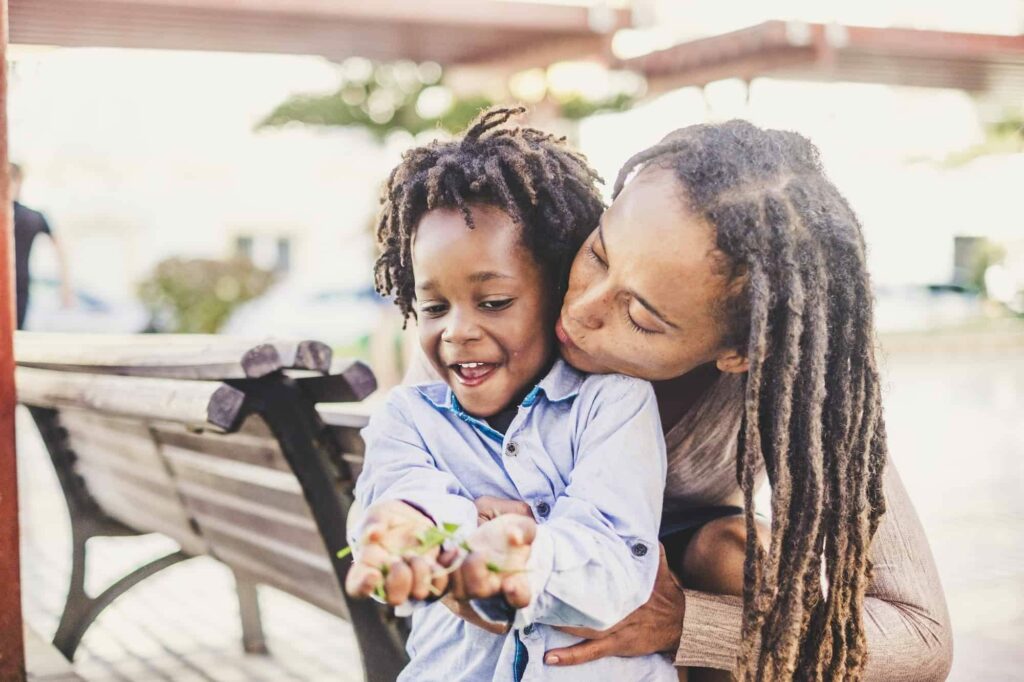 Happy couple black african skin people mother and son